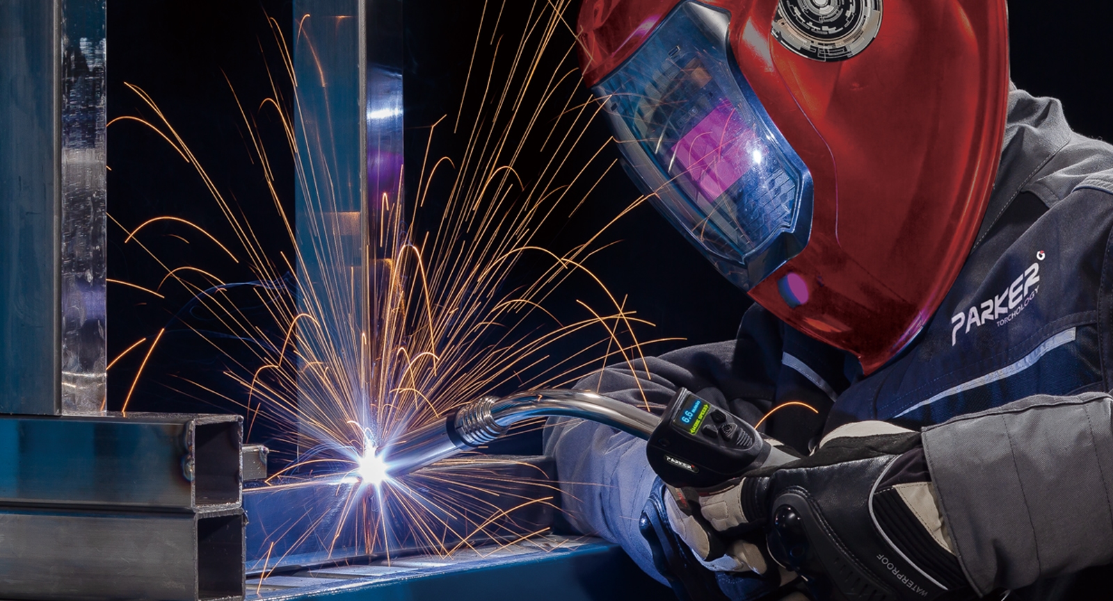 Welder using a Parker Suregrip Digi Mig welding torch.